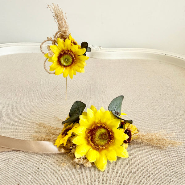 Sunflower headband and corsage set on a neutral background