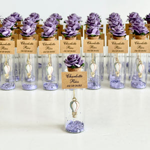 Decorative items with purple flowers and labels on a white background