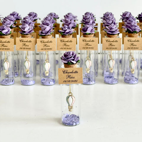 Decorative items with purple flowers and labels on a white background