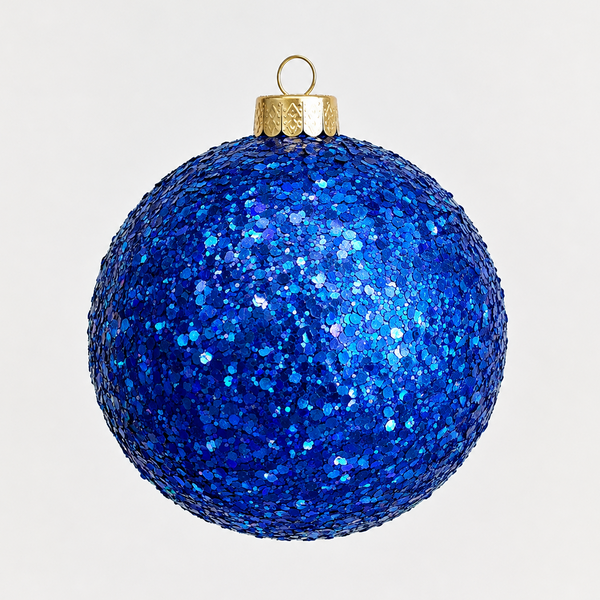 A spherical Christmas ornament covered in dense royal blue glitter, with a gold cap and hanging loop, centered on a light gray background.