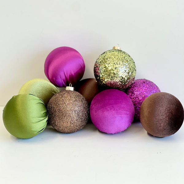 Colorful Christmas ornaments on a white background