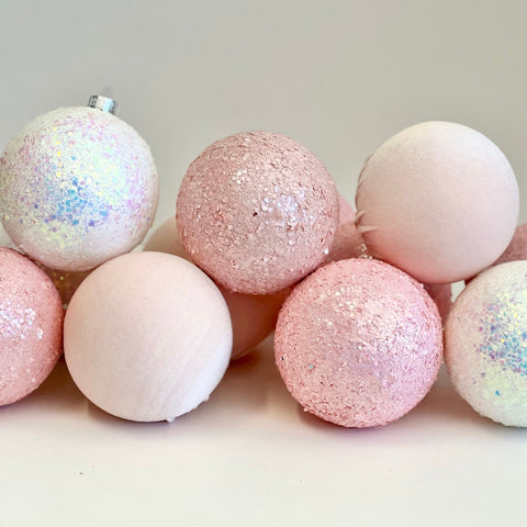 Pink and white glittery Christmas ornaments 