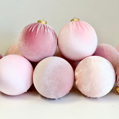 Pink velvet ornaments with gold caps 